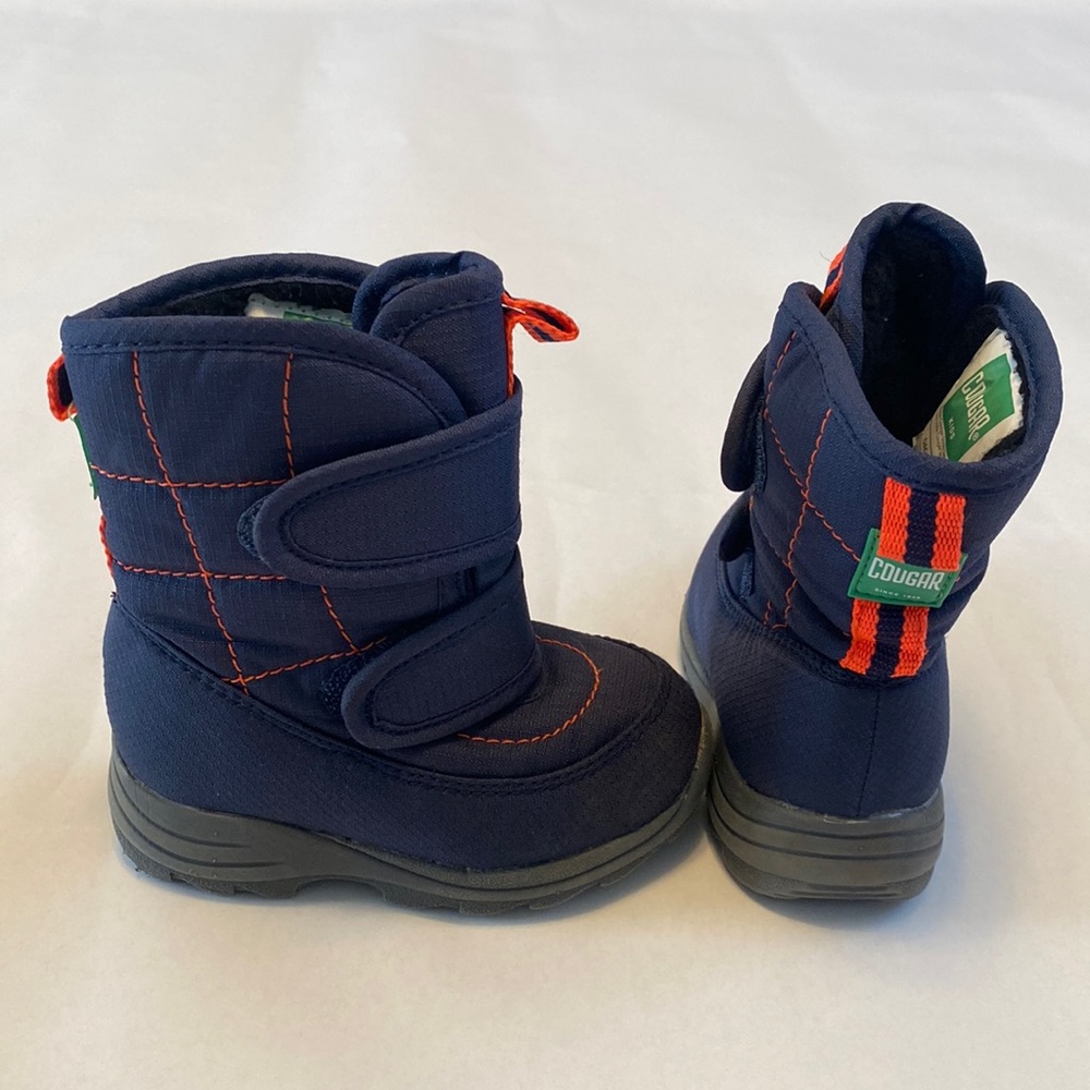 Cougar boots winter. Size 5. Navy with orange stitching.